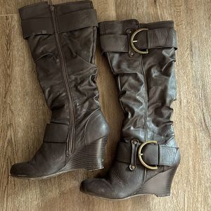 Woman’s wedge boots. Size 8.